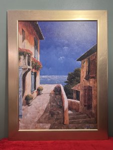 Giles Archambault 'Villa by The Sea' Acrylic Painting On Board Circa - 1980 Composition - Acrylic Paint On Artist Board Artwork Title - 'Villa By The Sea' Brief Artist History - Gilles Archambault 1947- 2011 Gilles Archambault Began His career In The Advertising Business As A Photographer/ Illustrator. With over 100 Book Covers And Illustrative designs For Kraft Gebral Foods, Readers Digest And Bristol-Myers, Archambault Changed Direction In 1979 Devoting himself Entirely To His Rapture For Painting. For Many Years Watercolour Was A passion; He Then Made An Alternation To Acrylic. In This new Medium, He Created Inspirational And Romantic European Subjects. Gilles Archanbault's Work Is Intended To Covey His Love of Sunshine, Light And his Fascination With The plays Of Shadow That Shape Existing Forms into Masses And create Their Own Distant Theme. His Artist Exhibitions Began In 1980. Listing Description Large Original Acrylic Painting By Artist Gilles Archambault. This Vibrant Artwork Showcases A Spanish Headland View Out To Sea. Stunning Architectural Scene Of Romantic Villas, With Shuttered Windows And An Abundance Of Bright Floral Baskets. Vibrant Hues Reminiscent Of Summer Getaways. Amazing Artwork For Contemporary Interior. Signed By Artist G ARCHAMBAULT (Right Lower Corner) And Set In Gilt Wood Frame. Dimensions In Inches Height 42.5" X Width 32.5"