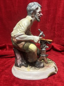 The Cobbler/ Shoe Maker Italian Capodimonte Porcelain Figurine Circa - 1970 Composition - Hard Paste Porcelain Listing Description Authentic Vintage Capodimonte The Cobbler, Stamped By Foundry. Dimensions in Cms Height 29cm X Width 20cm X Depth 22cm