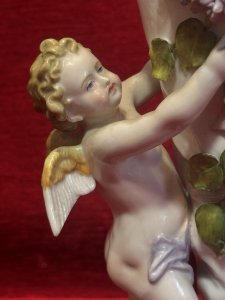 Antique Dresden Porcelain Cherub & Wisteria Decorative Vase Circa - 19th Century Composition - Porcelain Listing Description Rare 19th Century Wisteria And Winged Cherub Ornamental Vase. Fine Detail With Hand Sculpted Cherubs Holding Up Cornucopia Shaped Flower Urn Decorated With Wisteria Vines. Dresden Foundry Mark On Base. Dimensions In Cms Height 28cm X Width 18cm at Base Mouth Opening 12cm x 10cm