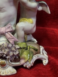 Antique Dresden Porcelain Cherub & Wisteria Decorative Vase Circa - 19th Century Composition - Porcelain Listing Description Rare 19th Century Wisteria And Winged Cherub Ornamental Vase. Fine Detail With Hand Sculpted Cherubs Holding Up Cornucopia Shaped Flower Urn Decorated With Wisteria Vines. Dresden Foundry Mark On Base. Dimensions In Cms Height 28cm X Width 18cm at Base Mouth Opening 12cm x 10cm