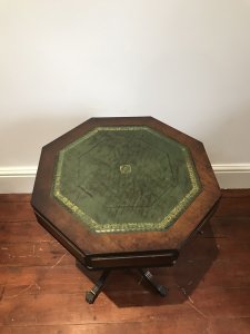 Regency Style Hexagonal Centre Table With Tooled Green Leather Top For Writing Two Drawers With Brass Handles Regency Style Tripod Legs With Brass Claw Feet With Castors Stunning Red Walnut With Beautiful Patina Lovely Condition Useful Piece Dimensions In Inches Height 23.5” Width 19.25” Depth 19.25”