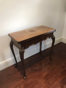 Waring And Gillow Charles I Style Walnut Card Table Lancaster Factory Stamped By Maker No 76857/1 And Plaque Inside Elegant Period Charles I Legs Turn Around Top To Reveal Storage Compartment For Games Ect Lovely Original Beize Green Top Lovely Patina Dimensions In Inches Height 30.5” Width 30” Depth 13.5”