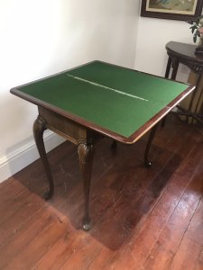 Waring And Gillow Charles I Style Walnut Card Table Lancaster Factory Stamped By Maker No 76857/1 And Plaque Inside Elegant Period Charles I Legs Turn Around Top To Reveal Storage Compartment For Games Ect Lovely Original Beize Green Top Lovely Patina Dimensions In Inches Height 30.5” Width 30” Depth 13.5”