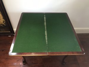 Waring And Gillow Charles I Style Walnut Card Table Lancaster Factory Stamped By Maker No 76857/1 And Plaque Inside Elegant Period Charles I Legs Turn Around Top To Reveal Storage Compartment For Games Ect Lovely Original Beize Green Top Lovely Patina Dimensions In Inches Height 30.5” Width 30” Depth 13.5”
