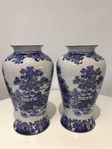 Pair Of Fine Landscape Oriental Pictorial Scene Porcelain Glazed Vases Scene Glazed On The Vases With A Transfer Matching Pair In Blue And White Floral Pictorial Scene Lovely Quality Pair Stamped On The Base Made In London Believed To Be A Factory Reproduction Dimensions In Inches Height 10.1/4” Width at Widest point 6” Base width 5” Neck width 3.5”