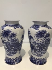 Pair Of Fine Landscape Oriental Pictorial Scene Porcelain Glazed Vases Scene Glazed On The Vases With A Transfer Matching Pair In Blue And White Floral Pictorial Scene Lovely Quality Pair Stamped On The Base Made In London Believed To Be A Factory Reproduction Dimensions In Inches Height 10.1/4” Width at Widest point 6” Base width 5” Neck width 3.5”
