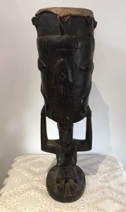 Rare Antique Carved Wood Fertility Drum Of African Tribal Woman . Circa 1890 African Tribes Use The Tribal Drum For A Tribal Dance To Celebrate Pregnancy Calf Hide Skin Top Supported By African Woman’s Head And Arms With Carved Fish & Serpents Adorning The Drum Interesting Facial Features And Body Comes Complete With Intertwined Tripod Leg Table Base With Carved Elephant And Rhino Top Museum Quality Very Interesting Items Provenance Part Of Lord Hill Museum Collection Dimensions In Inches Drum Height Drum Width Table Height Table Width