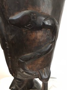 Rare Antique Carved Wood Fertility Drum Of African Tribal Woman . Circa 1890 African Tribes Use The Tribal Drum For A Tribal Dance To Celebrate Pregnancy Calf Hide Skin Top Supported By African Woman’s Head And Arms With Carved Fish & Serpents Adorning The Drum Interesting Facial Features And Body Comes Complete With Intertwined Tripod Leg Table Base With Carved Elephant And Rhino Top Museum Quality Very Interesting Items Provenance Part Of Lord Hill Museum Collection Dimensions In Inches Drum Height Drum Width Table Height Table Width