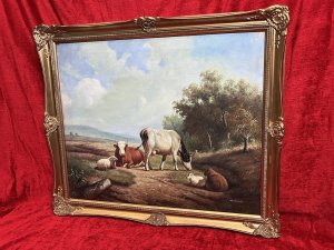Fine British Oil Painting Of Horned Cattle Grazing With Sheep In Landscape Signed by Artist Woodcock Circa -1970 Composition - Oil On Canvas Listing Description Wonderful Vivid British Countryside Scene, With Central View of Horned Cattle Grazing Alongside Resting Sheep. Delightfully Painted by Accomplished Hand In The Manner Of Artist Thomas Sidney Cooper With Bright Sun And Intense Shadows, Native Trees (Right Side) And Great Perspective. Signed By British Artist Woodcock And Set Inside Ornate Gilt Wood Frame. Dimension In Inches Height 23.5" X Width 27.5"