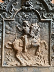 Museum Grade Edward III Rare Cast Iron Fire Back Plate With Basket Grate. Circa -1490 Composition- Cast Iron Rare Historic Ornate Artwork Fire Back Plate Thought To Be From Bodium Castle, East Sussex, England. Depicting King Edward III Upon Horse Back With Roaring Lion Motif Top And Decorative Grape Vines. The Cast Iron Log Basket Grate Is Not Original To Back Plate But Complements With Practically. Dimensions In Inches Back Plate Central Height 27” X Width 21 1/4” X Depth 1 1/4” Basket Grate Height 9” X Width 19” X Depth 11”