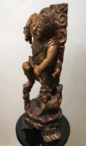 Late 19th Century Oriental Chinese Foo Man Sculpture Carved In Fruitwood Chinese Huntsman With Foo Dog Standing Upon Plinth With 4 Carved Feet Both With Glass Radiant Eyes Amazing Quality And Detail Exceptionally Well Executed Hand Carving Out Of One Piece Of Rare Wood Unsigned Collectors Item Circa - 1875 Dimensions In Inches Height 23” Width 9” Weight Approx 10kg