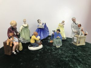 Amazing Collection Of Royal Doulton 7 Figurines Signed And Numbered. Royal Dolton 1 - Girl Evacuee (Girl With Teddy) No 1511 2- Child Hood Days (Boy With Dog) No HN 2967 3- Tuppence A Bag (Lady Feeding Pigeons Mary Poppins Reference) No HN 2320 4- Thanks Doc ( Vet With Dog) No 2721 5- Fair Lady (Dancing Girl Green Gown) No HN 2193 6- Elaine (Dancing Girl Blue Gown With Fan) No HN 2793 7- Paula ( Dancing Girl Yellow Gown) No HN 2906 Rare Items Amazing Collection Of Royal Dolton Figurines 7 Items In The Collection 1970’s Models All Signed And Numbered Sold As A Collection From Lords Hill Museum All Perfect Condition A Very Interesting Lot