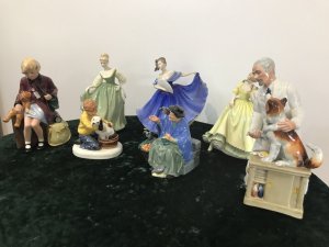 Amazing Collection Of Royal Doulton 7 Figurines Signed And Numbered. Royal Dolton 1 - Girl Evacuee (Girl With Teddy) No 1511 2- Child Hood Days (Boy With Dog) No HN 2967 3- Tuppence A Bag (Lady Feeding Pigeons Mary Poppins Reference) No HN 2320 4- Thanks Doc ( Vet With Dog) No 2721 5- Fair Lady (Dancing Girl Green Gown) No HN 2193 6- Elaine (Dancing Girl Blue Gown With Fan) No HN 2793 7- Paula ( Dancing Girl Yellow Gown) No HN 2906 Rare Items Amazing Collection Of Royal Dolton Figurines 7 Items In The Collection 1970’s Models All Signed And Numbered Sold As A Collection From Lords Hill Museum All Perfect Condition A Very Interesting Lot