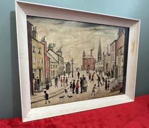 L S Lowry 'A Lancashire Village' Framed Ganymed Turnstile Print Circa - 1960 Composition - Printed Lithograph On Artists Board Brief Artist History Laurence Stephen Lowry 1887-1976 Born into a middle class family and raised in the leafy outskirts of Manchester. Lowrys famous for painting scenes of life in in industrial districts of the North West Of England, where he lived and worked for more than 40 years. He developed a distinctive style of Nieve painting and is best known for his urban landscapes with multiple figures referred to as "Matchstick men". Lowry was never a full time artist. In his early 20's he took a job as a rent collector, and this would be his primary trade for four decades. Although Lowry painted most days after work, Often late into the night, and firmly rejected the term 'Sunday Painter' Remarking 'I'm a Sunday painter that paints every day of the week!" Lowry never adopted a impressionist colour palette and claimed to use five colours vermillion, ivory black, Prussian blue, yellow ochre and flake white. A large collection of Lowrys artworks are on permanent display in 'The Lowry Art Gallery' Salford Quays, named in his honour. Listing Description 'When it comes to buying limited edition prints by L S Lowry (1887-1976) those produced by one publisher in particular stand above the rest for collectors. Londons Ganymed Press produced 16 signed edition lithographs during the 1960's and in small runs of around 75 drawings that Lowry made specifically for reproduction' Antiques Trade Gazette Original Lithograph of L S Lowry Titled 'A Lancashire Village' Showcasing A Vibrant Street View, Gazing Down A Meandering Road In Idylic Lancashire Village. The Central Focus Of Large Red Home With Smoking Chimney, Towered Over By Large Church Spire. The Busy Sidewalks With Many Matchstick Figures Going About Their Daily Business, With Various Houses Of All Shapes And Sizes. Wonderful Composition By Exceptional British Artist L S LOWRY. Lithograph Print By Ganymed Turnstile Printing Press London. Set In Original Painted Wood Frame With Printers Label Upon Reverse. Dimensions In Inches Height 17" X Width 22 1/4" For Further information Please Call 07707488566 Thank-you