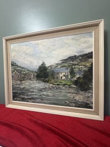 20th Century Fine Art Barbara Butcher 'The River Beddgelert' Oil Painting Circa -20th Century Composition - Oil On Canvas Listing Description Fine Quality Oil Painting By Known Artist Barbara Butcher Showcasing Picturesque Riverbank Scene Titled 'The River Beddgelert' This Refers To The Confluence Of Both Afon Glaslyn Which Flows Through The Village Of Beddgelert, And Is Joined By Afon Colony At This Point Shown In The Painting. Exceptionally Skilled Painting Of Welsh Village, Detailed Stone Houses And Rock Filled River Gorge. A Must Have For Art Lover Of Welsh Heritage Scenes. Dimensions in Cms Height 53.5cm X Width 66cm For Further Information Please Call Our Museum Curator On 07707 488566 Thank-you.