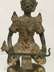 Exceptional 19th Century Gilt Bronze Meditation Pose Buddha In Fine Detail Buddha Bronze With Detailed Facial Features With Intricate Pattern And Floral Motifs Over The Gilt Clothing. Tall Hat And And Shaped Shoulders Buddha Holds A Crop In Lovely Unusual Kneeling Meditation Pose Original Condition With Lovely Patina Origin- India Provenance Purchased From USA Collection Dimensions In Inches Height 7” Width 3 3/4” Weight Approx 1Kg
