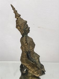 Exceptional 19th Century Gilt Bronze Meditation Pose Buddha In Fine Detail Buddha Bronze With Detailed Facial Features With Intricate Pattern And Floral Motifs Over The Gilt Clothing. Tall Hat And And Shaped Shoulders Buddha Holds A Crop In Lovely Unusual Kneeling Meditation Pose Original Condition With Lovely Patina Origin- India Provenance Purchased From USA Collection Dimensions In Inches Height 7” Width 3 3/4” Weight Approx 1Kg