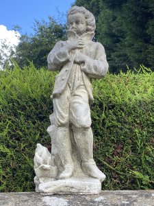 Classical Young Georgian Aristocrat Nobleman Garden Sculpture. Young Aristocratic Gentleman In The Georgian Style Wears Long Buttoned Coat, Shorts And Laced Up Boots. The Young Male Holding Coat Closed At The Top Make Him Look Mischievous. Beautifully Sculpted Fabric Movement. Lovely Facial Details. Vintage Piece. Dimensions In Inches Height 28” Width 10” Depth 9” Weight Approx 40KG