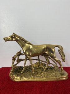 Brass Stallion Sculpture After P J Mene Titled Djinn-Etalon Barbe. Circa - 20th Century Reproduction Composition - Brass Reworked Of Original French Bronze Sculpture Titled Djinn- Etalon Barbe. Brass Sculptured Study After Pierre Jules Mene Of Stallion Standing By Rustic Picket Fence. Set Upon Textural Integral Base With Engraved Detailing Signed Dimensions In Inches Height 7” Width 9” Depth 3”