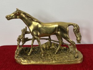 Brass Stallion Sculpture After P J Mene Titled Djinn-Etalon Barbe. Circa - 20th Century Reproduction Composition - Brass Reworked Of Original French Bronze Sculpture Titled Djinn- Etalon Barbe. Brass Sculptured Study After Pierre Jules Mene Of Stallion Standing By Rustic Picket Fence. Set Upon Textural Integral Base With Engraved Detailing Signed Dimensions In Inches Height 7” Width 9” Depth 3”