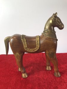 Carved Sculptured Wood Trojan Horse Of Troy With Brass Details Circa - 1960’s Origin- Spain Heavy Carved Wood & Brass Trojan Horse Sculpture In Fine Detail Brass Covered Masked Head With Brass Hooves, Tail And Saddle Decoration. Fine Brass Decorative Plaques On Flanks Hand Made And Stunning Quality Ornamental Piece Dimensions In Inches Height 14” Width 12” Depth 4”