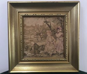 Fine Reproduction 18th Century Style French Figures Tapestry Set In French Chateau Garden Beautifully Gowned Mother And Child And The Father Kneeling Recovering His Hat From The Stream With A Stick Charming Subject Silk Work Tapestry Fine Detail Set In Stunning Gilt Wood Frame Dimensions In Inches Height 14” Width 14”