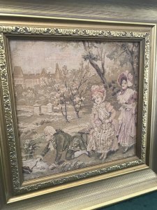 Fine Reproduction 18th Century Style French Figures Tapestry Set In French Chateau Garden Beautifully Gowned Mother And Child And The Father Kneeling Recovering His Hat From The Stream With A Stick Charming Subject Silk Work Tapestry Fine Detail Set In Stunning Gilt Wood Frame Dimensions In Inches Height 14” Width 14”