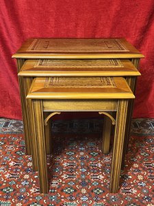 Chippendale Style Elmwood Trio Of Nesting Tables With Tan Leather Tops Circa - Vintage Composition - Solid Elmwood With Leather Tops Listing Description Chippendale Style Set Of Three Elmwood Rectangular Nesting Tables With Tan Tooled Leather Tops. Resting On Ornate Carved Corner Brackets And Set Upon Reeded Legs. Stunning Honey Elmwood Colouration With Polished Patina. Quality Usable Trio For Lounge, Office, Living Area Or Study. Dimensions In Inches Height 20 3/4" X Width 22" X Depth 15.5" For Further Information Please Call 07376 618513 Thank-you