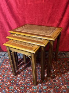 Chippendale Style Elmwood Trio Of Nesting Tables With Tan Leather Tops Circa - Vintage Composition - Solid Elmwood With Leather Tops Listing Description Chippendale Style Set Of Three Elmwood Rectangular Nesting Tables With Tan Tooled Leather Tops. Resting On Ornate Carved Corner Brackets And Set Upon Reeded Legs. Stunning Honey Elmwood Colouration With Polished Patina. Quality Usable Trio For Lounge, Office, Living Area Or Study. Dimensions In Inches Height 20 3/4" X Width 22" X Depth 15.5" For Further Information Please Call 07376 618513 Thank-you