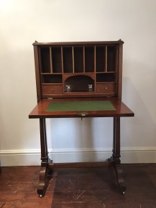 Fine Victorian Sheritan Style Escritoire On Stand Solid Mahogany With Satinwood String Inlays And Classical Shell Motif Design Ornate Brass Gallery Around The Top Brass Carry Handles On The Side Panels The Drop Down Front Reveals Pigeon Holes, Two Drawers, Ink Well Compartments And Pen Placement Four Sabre Shaped Feet With Brass Castor Feet For Ease Of Movement Handmade By English Cabinet Maker But Unsigned Rare Writing Cabinets Like This Were Sometimes Used By Sea Captains Aboard Ships Please Note This Is A Antique Piece And Has Some Signs Of Wear Conductive To Age And Usage One Of The Side Handles Is Missing, There Are Minor Cracks In The Woodwork And Minor Marks On The Felt Writing Top Please See All Pictures Dimensions In Inches Height 481/4” Width 27” Depth 18”