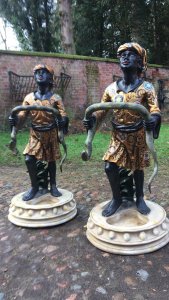 Grand Tour 20th Century Tour Pair Of Blackamour Figures Aynhoe Park Manor. Composition- Fibreglass Compound Resin Age - Vintage Reproduction Pair Of Vintage Hand Crafted Blackamoor Figures Holding A Serpent In Gilt Gowns And Colonial Headwear Decorated With Colourful Mythological Ornamental Floral Motifs . For Use As Walking/ Hunting Cane / Umbrella Stands. High Quality Pair In Fabulous Detail With Detailed Facial Features, Hands And Feet. Stunning Elegant Statement Pair For Manor House/ Stately Home / Hotel / Boutique. Grand Tour Aynhoe Park Style. Dimensions In Inches Height 50” Width 22” Base Diameter 21”