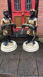 Grand Tour 20th Century Tour Pair Of Blackamour Figures Aynhoe Park Manor. Composition- Fibreglass Compound Resin Age - Vintage Reproduction Pair Of Vintage Hand Crafted Blackamoor Figures Holding A Serpent In Gilt Gowns And Colonial Headwear Decorated With Colourful Mythological Ornamental Floral Motifs . For Use As Walking/ Hunting Cane / Umbrella Stands. High Quality Pair In Fabulous Detail With Detailed Facial Features, Hands And Feet. Stunning Elegant Statement Pair For Manor House/ Stately Home / Hotel / Boutique. Grand Tour Aynhoe Park Style. Dimensions In Inches Height 50” Width 22” Base Diameter 21”