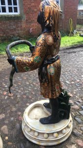 Grand Tour 20th Century Tour Pair Of Blackamour Figures Aynhoe Park Manor. Composition- Fibreglass Compound Resin Age - Vintage Reproduction Pair Of Vintage Hand Crafted Blackamoor Figures Holding A Serpent In Gilt Gowns And Colonial Headwear Decorated With Colourful Mythological Ornamental Floral Motifs . For Use As Walking/ Hunting Cane / Umbrella Stands. High Quality Pair In Fabulous Detail With Detailed Facial Features, Hands And Feet. Stunning Elegant Statement Pair For Manor House/ Stately Home / Hotel / Boutique. Grand Tour Aynhoe Park Style. Dimensions In Inches Height 50” Width 22” Base Diameter 21”