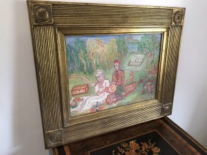 Original Contemporary Oil On Canvas Painting By Shiela Parker Dunbar Walker Landscape With A Man And Woman Having A Picnic With A Bottle Of Wine With A House, Garden And Foliage In The Background Quirky Subject A Type Of Folk Art Wonderful Colour Coordination Set In Ornate Gilt Wood Frame Dated 1970 - 1975 Exhibited In Paris Exhibition Dimensions In Inches Height 19” Width 23” Depth 1”