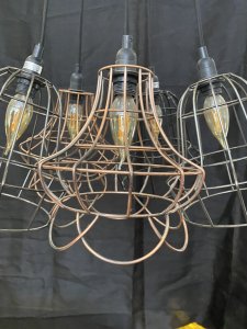 Modernistic Five Bulb With Wirework Shades Saloon Style Chandelier Centrepiece. Circa - 20th Century Composition - Metal Fixture/ Wirework Shades Large Modernistic 5 Bulb Spider Chandelier With Decorative Wirework Shades And Candle Bulbs. Gunmetal Circular Top Mount Ready To Wire In Position. Five Shades In Gunmetal And Bronze Wirework.Can Be Hung As Shown Or Each Wire Can Be Positioned On Ceiling As Spider Fixture. Wiring In Good Order We Advise Pat Testing On Electrical Products Before Use. Dimensions In Inches Hanging Height 43" Chandelier Width As Shown 22"