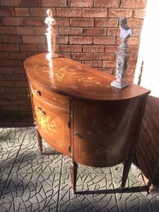 Italianate Marquetry Bow Front Commode With Floral Bouquet Inlays Solid Burl Walnut Bow Front Commode Chest With Fine Veneer Inlays Of Floral Bouquets And Musical Instruments In Olive Wood, Satinwood And Tulip Wood. Two Opening Side Cupboards, Opening Centre Cupboard (2 Doors) And Top Pull Out Draw With Ormolu Mounted Legs And Supports. Stunning Piece In The Style Of Marie Antoinette Paris. Elegant Ladies Boudoir Piece Condition - Lovely Used Please Note This Piece Has Age And Due To Usage Has Minor Scratches And Signs Of Use The Top Pull Out Draw Has A Small Crack In The Inlay On The Right Side Please See Images Dimensions In Inches Height 36 1/4” Width 41.5” Depth 17.5”