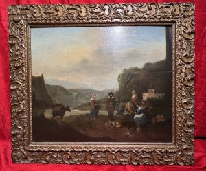 Dutch 18th Century Old Master Oil Painting With Peasant Figures In Castle Landscape Circa - 1750 Composition - Oil On Wooden Panel Listing Description Wonderful 18th Century Dutch School Oil Painting Upon Wooden Panel. In The Forefront Of The Landscape Are Severn Pheasant Figures Painted In Fine Detail Including Three Maidens, Three Gentlemen And A Child. Amongst Them Stand Two Donkeys, One Bearing A Large Wicker Basket Upon Its Back. Presumably Carrying An Abundance Of Fruit, Some of Which Lies At The Feet Of The Central Gentleman. Finely Detailed Background With Exceptional Perspective Showcasing Mountinous Landscape And Meandering River. A Large Fort Sits Upon The Hillside With Elaborate Gate House To The Right Of The Figures. Set In Original Gilt-wood Frame. Unsigned Condition - Very Good Paintwork With Blemishes And Cracking Conducive To Age And Usage. Dimensions In Inches Height 23.5" Width 27"