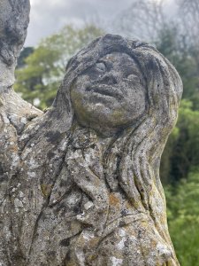 Vintage Jolly Farmer And His Wife Embracing Garden Statue. Circa - Vintage Composition- Reconstituted Stone Smartly Clothed Farming Gentleman Wearing A Flat Cap Holding The Hand Of His Wife Wearing Elaborate Frilled Gown. Smiling Faces With Lovely Details. Heavy Statue 20KG Approx Dimensions In Cms Height Width Depth