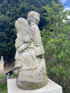 Vintage Jolly Farmer And His Wife Embracing Garden Statue. Circa - Vintage Composition- Reconstituted Stone Smartly Clothed Farming Gentleman Wearing A Flat Cap Holding The Hand Of His Wife Wearing Elaborate Frilled Gown. Smiling Faces With Lovely Details. Heavy Statue 20KG Approx Dimensions In Cms Height Width Depth