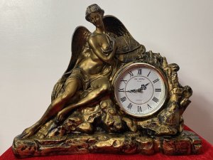 Classical Athena Goddess Of Wisdom Ornate Gilded Mantle Clock W M Widdop Movement Circa - Vintage Composition - Resin Listing Description Ornate Mythological Decorative Mantle Clock Depicting Half Nubile Winged Goddess Of Wisdom And War Athena. Beautifully Posed Female Sitting Perched On A Rock Cluster Holding The Aegis Shield. Stunning Details Of Facial Features, Delicate Hands And Feet With Large Angel Wings In Textural Feathers. Hand Crafted Piece In Resin With Antiqued Guilt Work Finish . Internal W M Widdop Est 1883 Quartz Japanese Movement With Battery Power Source, Requires One AA Battery. Dimensions In Inches Height 40cm Width 46cm Depth 16cm