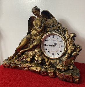Classical Athena Goddess Of Wisdom Ornate Gilded Mantle Clock W M Widdop Movement Circa - Vintage Composition - Resin Listing Description Ornate Mythological Decorative Mantle Clock Depicting Half Nubile Winged Goddess Of Wisdom And War Athena. Beautifully Posed Female Sitting Perched On A Rock Cluster Holding The Aegis Shield. Stunning Details Of Facial Features, Delicate Hands And Feet With Large Angel Wings In Textural Feathers. Hand Crafted Piece In Resin With Antiqued Guilt Work Finish . Internal W M Widdop Est 1883 Quartz Japanese Movement With Battery Power Source, Requires One AA Battery. Dimensions In Inches Height 40cm Width 46cm Depth 16cm