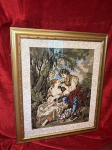 French Wool-Work Tapestry Of Lovers Romancing In Garden Scene Framed Circa - 1950's Composition - Wool-Work Tapestry In Glazed Gilt Frame Listing Description Wonderful French Wool-work Composition Depicting 18th Century French Lovers Romancing. The Lady Holding Flowers Sits Gazing Towards A Handsome Nobleman, His Arm Reaches Around Her Shoulder. A Basket Of Roses Upon The Ground. Both Figures In Clothing Of The Period Surrounded By Abundant Foliage. Finely Detailed Tapestry In Wonderful Vibrant Hues Set In Glazed Gilt Frame With Boarder. Dimensions In Inches Height 36" X Width 30 3/4" For Further Information Please Call 07376 618513 Thank-you