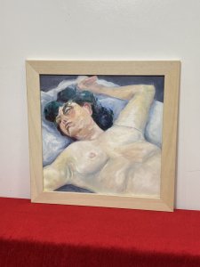 Figurative Nude Portrait Of Resting Female Muse By Artist Michael Jenkins. Beautiful Figurative Nude Portrait By Accomplished Contemporary Artist Michael Jenkins. Half Portrait Of Pale Skin Nude With Striking Black Hair. Stunning Attention To Detail With Delicate Facial Features And Elaborate Shadows In Complementary Blue/ Grey Tones. Perfect Piece For Centre Piece Or Over Mantle Display. Incredible Work Of Art In Oil And Acrylic On Board. Set In Pine Frame This Nude Portrait By Charismatic Artist Claude Micheal Gay Jenkins Sadly Deceased 2011 Was Exhibited As Part Of His Naked Form Exhibition May-July 2010 At The Farfield Mill Arts And Heritage Centre In The Howgill Gallery,Sedberg, Yorkshire. Brief Artist History Michael was born in London and educated in England, Scotland and Germany. He was always interested in art from an early age and at school was given freedom and encouragement to explore his grand passion whenever possible. Aged 15, he spent three weeks alone in Florence where he apparently “discovered” Renaissance art and on his first visit to the Uffizi, he says the vision of Botticelli’s Birth of Venus was an epiphany. He has taught in schools in Oxford, Canada, Scotland and lived and worked in the Lake District since 1972, retiring in 1996. Dimensions In Inches Height 17 3/4” X Width 17 3/4”
