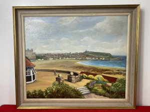 Cornish Costal Scape Of Sault Bay Oil On Canvas By Artist Vera Soper. Circa - 1970 Approx Medium- Oil On Canvas Stunning Contemporary Style Costal Scape Looking Out From A Landscaped Flower Filled Garden In The Picturesque Sault Bay, Cornwall. Fine Perspective With Intricate Details Of The Headland InThe Distance. A Curved Stone Wall Partitions The Immaculate Garden From The Beach With Lady Figure Holding A Dog Looking Out At The View. Delicately Painted Flora And Forna In Bright Colours. Set In Painted Gilt-wood Frame & Signed By Artist Vera Sopa. Dimensions In Inches Height 22 1/4” Width 26 1/4”