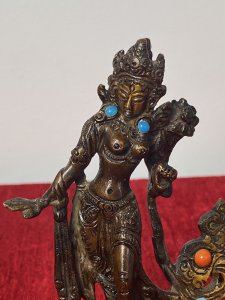 Miniature Cold Painted Bronze Statue Of Belly Dancer With Semi Precious Stones Circa - Vintage Composition - Cast Bronze Fine Quality Vintage Bronze Statue Of Lady Belly Dancer With Ornamental Headdress, Large Earrings Encrusted With Semi Precious Blue Stones. Detailed 'Bedlah' Outfit With Bustier Top, Flowing Skirt And Arm Embellishments. Stands Upon Decorative Circular Base. Collectors Item. Condition - Pristine Fully Restored Fine Quality And Rich Patina. Dimension In Inches Height 5" Width 3.5" Base 1 3/4" X 2"