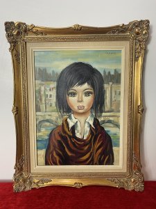 Italian Modern Caricature Style Oil Portrait Of Young Girl Signed SAGERI Circa - 20th Century Vintage Composition - Oil On Canvas Listing Description Beautiful And Interesting Composition Depicting The Half Portrait Of A Young Dark Haired Female, With Enlarged Cartoonist Features. The Females Head Is Disproportionate To The Body With Large Green Doll Like Eyes And Small Pursed Mouth. The Female Wears White Shirt With Elaborate Layered Over Robe. Focused Portrait With Unusual Impressionistic Venetian Landscape Background. A Stunning Conversation Artwork In Bold Colour Pallet. Signed by Artist SAGERI (Top Right Corner) And Set In Ornate Gilt Frame. Dimensions In Inches Height Width