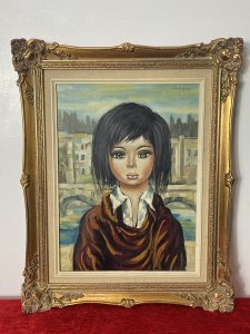 Italian Modern Caricature Style Oil Portrait Of Young Girl Signed SAGERI Circa - 20th Century Vintage Composition - Oil On Canvas Listing Description Beautiful And Interesting Composition Depicting The Half Portrait Of A Young Dark Haired Female, With Enlarged Cartoonist Features. The Females Head Is Disproportionate To The Body With Large Green Doll Like Eyes And Small Pursed Mouth. The Female Wears White Shirt With Elaborate Layered Over Robe. Focused Portrait With Unusual Impressionistic Venetian Landscape Background. A Stunning Conversation Artwork In Bold Colour Pallet. Signed by Artist SAGERI (Top Right Corner) And Set In Ornate Gilt Frame. Dimensions In Inches Height Width