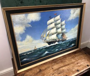 Oil On Canvas Marine Gallion Ship In Full Sail Sailing Past Small Yacht. Painted 1974 Artist T Banasiar Original 20th Century Artwork Original Oil On Canvas Painting Of Full Sailing Galleon Displaying Flags On The Top Of The Main Mast Unknown Country Full Rigging Painted In Lovely Detail With Rough Sea All Impressive Vibrant Colours With Great Perspective Although Little Is Known About This Scottish Marine Painter This Is Exceptionally Well Executed Marine Piece Charming Affordable Painting For Study Of Dining Area Dimensions In Inches Height 29” Width 41” Frame Depth 2.5”