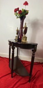 Vintage Regency Style Cherry Mahogany Demi-Lune Occasional Hall Table Circa - Vintage Composition - MDF Shell Overlaid With Cherry Mahogany Veneer Vintage Cherry Mahogany Demi Lune Occasional Hall Table In The Regency Style With Semi Circle Top And Pull Out Drawer With Brass Garland Handle For Storage Of Paperwork. Stands Upon Four Elegant Legs With Decorative Brass Floral Plaque Ornamentation With Brass Floor Mounts And Under Shelf For Ornament Display. Condition - Very Good Original A Couple Of Scratches To Top And One Of The Brass Foot Mounts Missing On Front Leg (Left Side). Please See Listing Images Dimensions In Inches Height 30" Width 31" Depth 15" Drawer Depth 2"