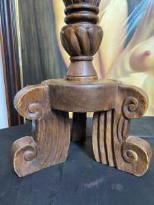 19th Century Large Pair Of Gothic Carved Walnut Tripod Candle Stands. Circa - 1865 Composition- Solid Walnut Condition- Lovely Used A Pair Of Solid Walnut Hand Carved Candles Stands With Shell Top Housing For Large Wax Candle With Decorative Pillar Enriched In Acanthus Leaf Motifs, Standing Upon Solid Tripod Plinth Bases. Beautiful Addition To Gothic Manor. Lovely For Next To An Elaborate Fireplace, Hallway Or Dining Area. Although These Are Being Sold As A Pair They Both Varies Slightly In Design. Please See Images Before Purchase. Provenance Purchased From Country Manor In The Scottish Highlands. Now Part Of Lord Hill Museum Private Collection. Dimensions In Inches Height 29.5” Top Housing Width 9” Tripod Base Width 10”